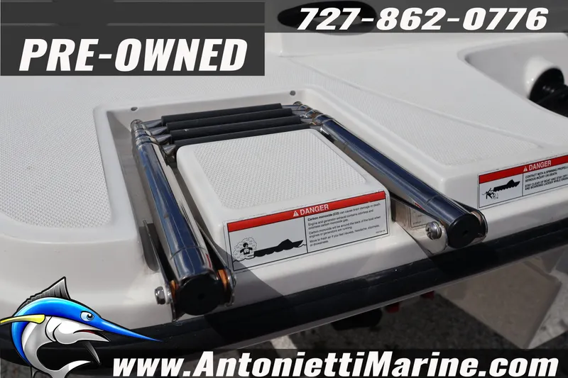 Slide: The Image of Pre-owned 2019 Sea Ray SPX 190 Outboard boat with swim platform ladder. - 7