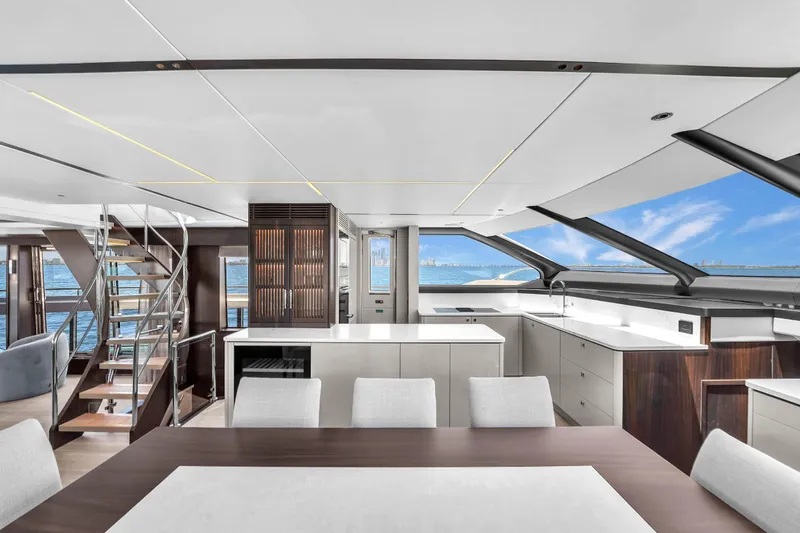 Slide: The Image of Luxurious interior of 2024 Sunseeker Ocean 182 yacht with modern kitchen and ocean view. - 11