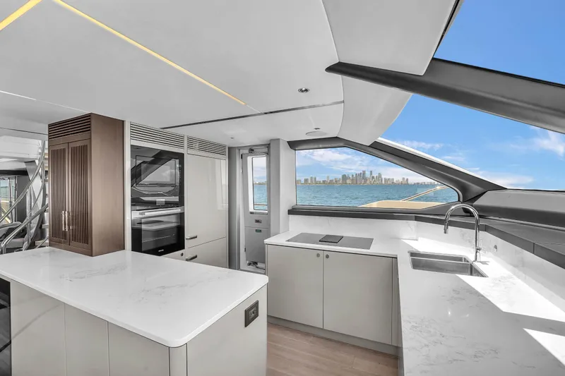Slide: The Image of Luxurious kitchen interior of 2024 Sunseeker Ocean 182 yacht with ocean view. - 12