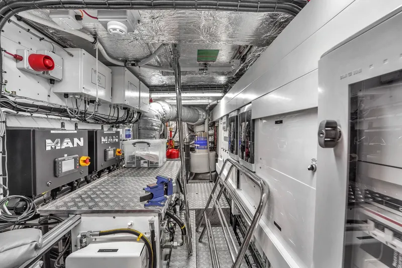 Slide: The Image of Engine room of 2024 Sunseeker Ocean 182 yacht, featuring advanced machinery and equipment. - 32