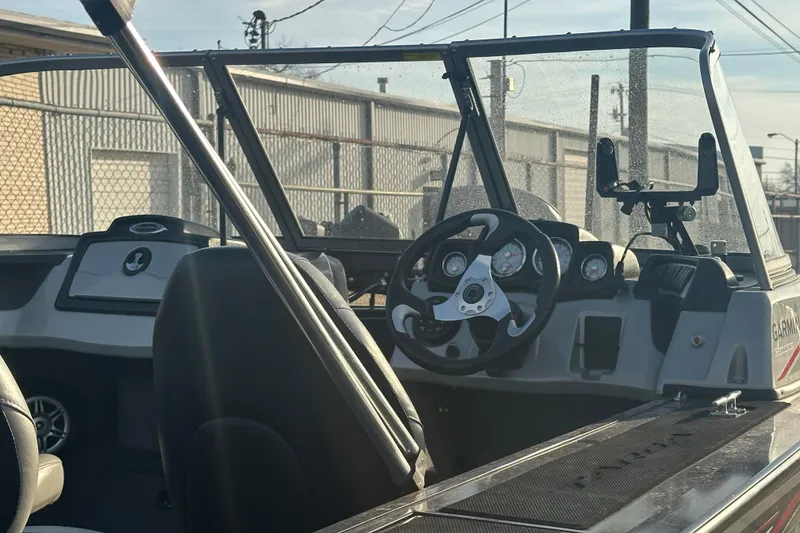 Slide: The Image of 2019 Tracker Targa V-18 Combo boat interior with steering wheel and dashboard. - 11