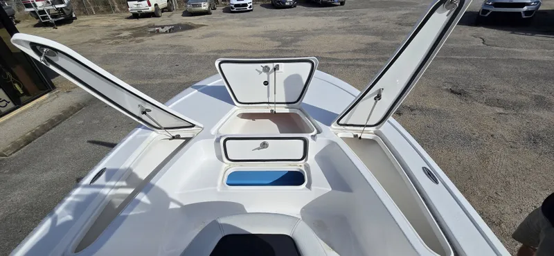 Slide: The Image of Tidewater 2110BMT 2026 with open storage compartments on deck. - 16