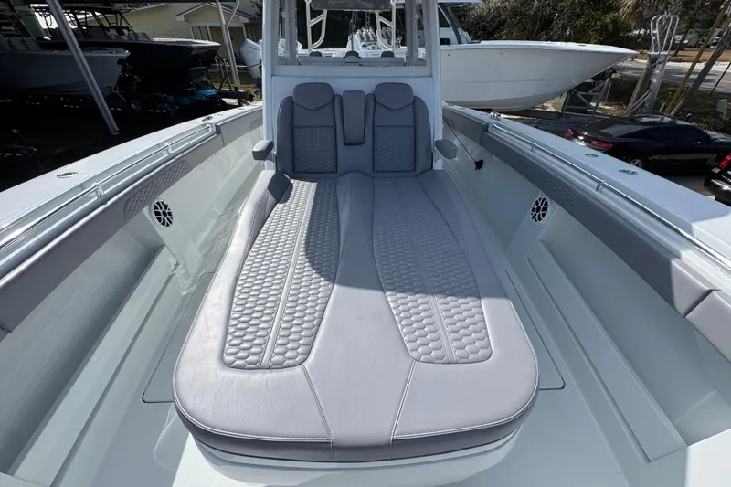 Slide: The Image of 2026 Invincible 43 Open Fisherman boat with sleek seating and modern design. - 26