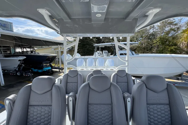 Slide: The Image of 2026 Invincible 43 Open Fisherman boat interior with sleek seating and modern design. - 39