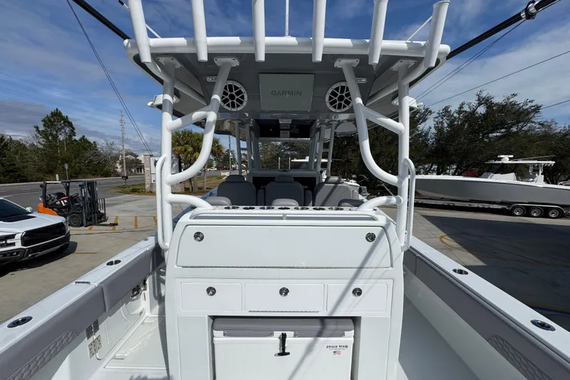 Slide: The Image of 2026 Invincible 43 Open Fisherman boat interior with advanced navigation equipment. - 49