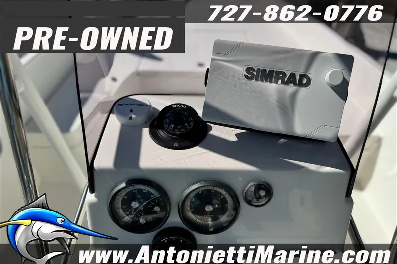 Slide: The Image of Pre-owned 2021 Bayliner Trophy T21Bay boat dashboard with Simrad navigation system. - 13