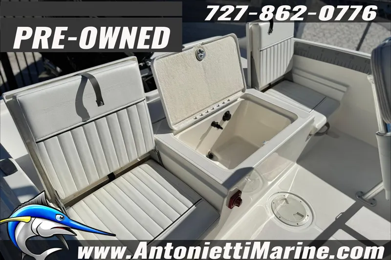 Slide: The Image of Pre-owned 2021 Bayliner Trophy T21Bay boat interior with seating and storage. - 19