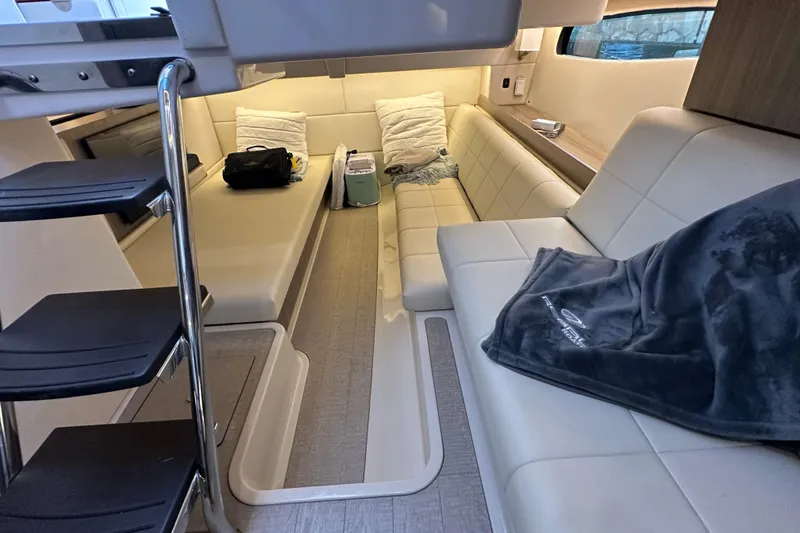 Slide: The Image of Luxurious interior of 2021 Regal 36 XO yacht with plush seating and modern design. - 27