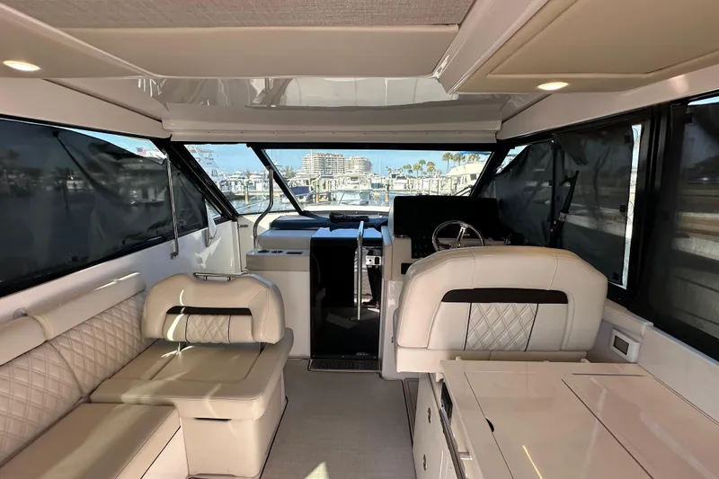 Slide: The Image of Luxurious interior of 2021 Regal 36 XO yacht with elegant seating and helm. - 3