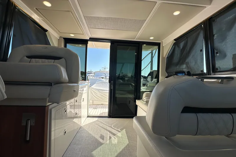 Slide: The Image of Interior of 2021 Regal 36 XO yacht with luxurious seating and modern design. - 31