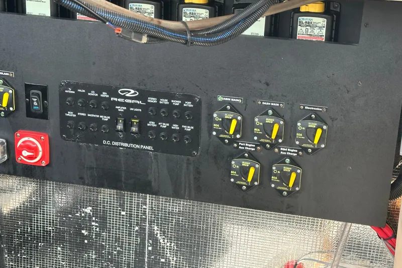 Slide: The Image of 2021 Regal 36 XO DC distribution panel with switches and wiring. - 45