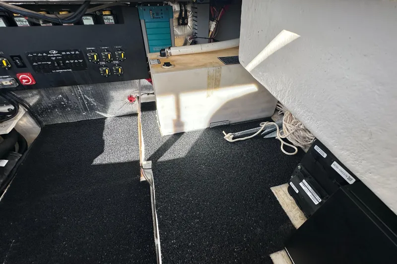 Slide: The Image of 2021 Regal 36 XO boat interior with control panel and storage area. - 46