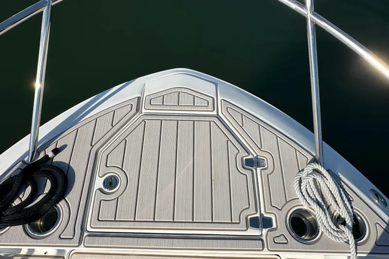 Slide: The Image of Bow of 2021 Regal 36 XO boat with deck details and ropes. - 51