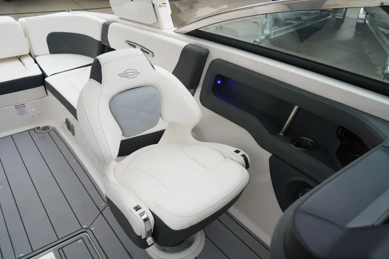 Slide: The Image of 2024 Chaparral 287 SSX boat interior with luxurious seating and modern design. - 10
