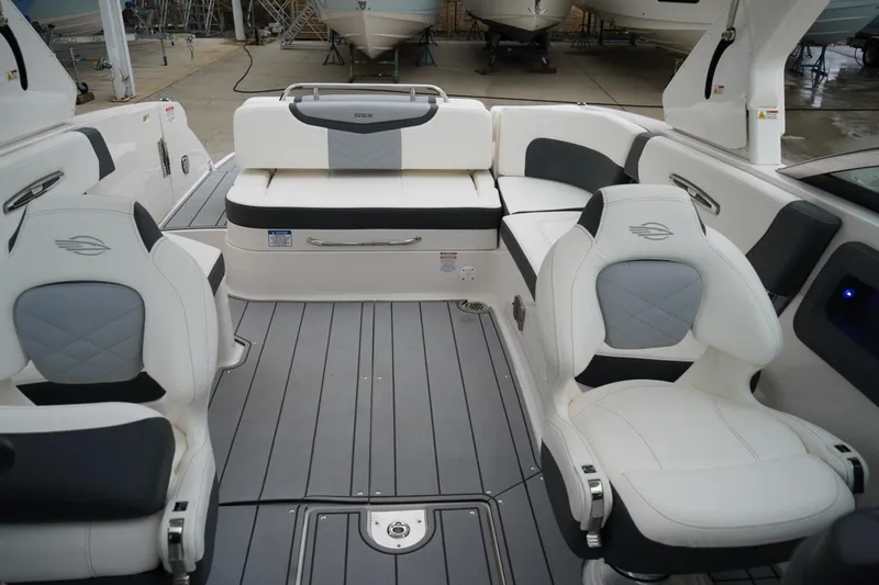 Slide: The Image of 2024 Chaparral 287 SSX boat interior with luxurious seating and modern design. - 11