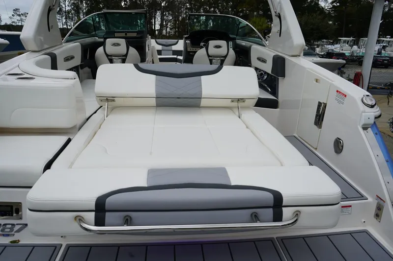 Slide: The Image of 2024 Chaparral 287 SSX boat interior with luxurious seating and modern design. - 12