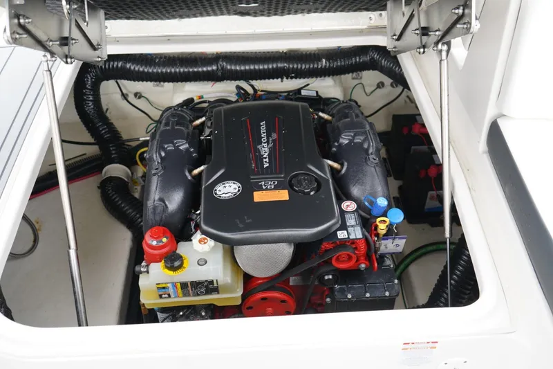 Slide: The Image of 2024 Chaparral 287 SSX boat engine compartment with Volvo Penta 430 V8 engine. - 13