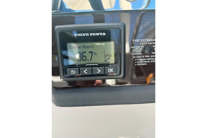 Slide: The Image of Volvo Penta engine display showing 36.7 hours on 2024 Chaparral 287 SSX boat. - 18