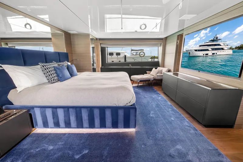 Slide: The Image of Luxurious 2023 Custom Line NAVETTA 42 yacht bedroom with modern design and elegant furnishings. - 26