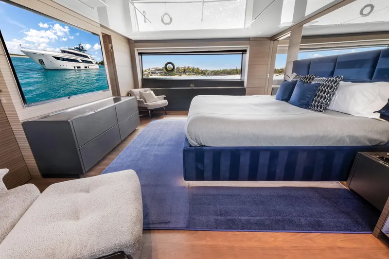 Slide: The Image of Luxurious bedroom interior on 2023 Custom Line NAVETTA 42 yacht with ocean view. - 27