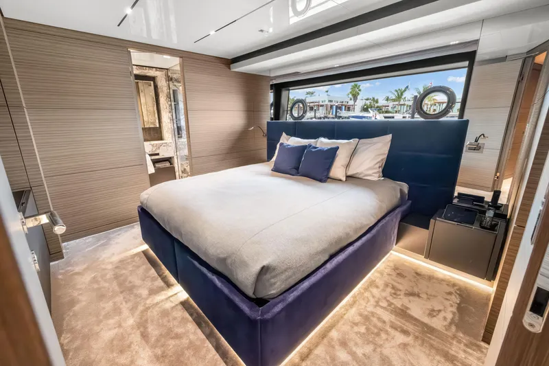 Slide: The Image of Luxurious bedroom interior of 2023 Custom Line NAVETTA 42 yacht with modern design elements. - 40