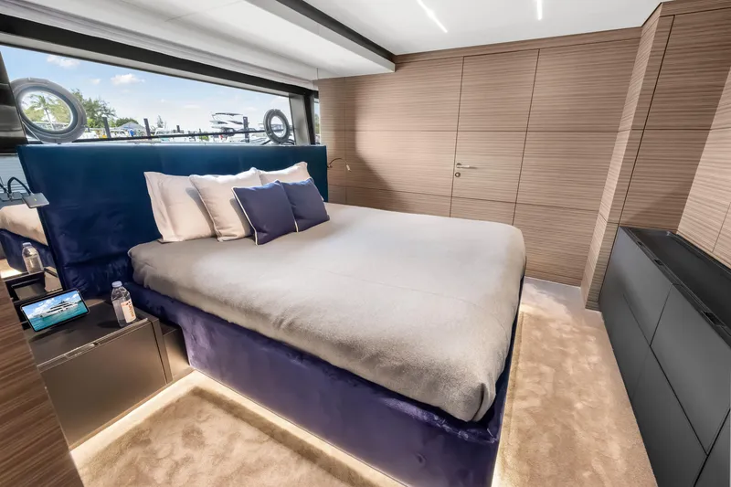 Slide: The Image of Luxurious bedroom interior of 2023 Custom Line NAVETTA 42 yacht with modern design. - 41
