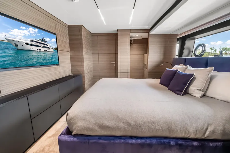 Slide: The Image of Luxurious bedroom interior of 2023 Custom Line NAVETTA 42 yacht with modern design. - 42
