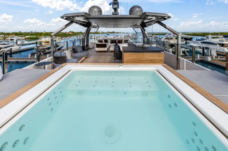 Slide: The Image of Luxurious interior of 2023 Custom Line NAVETTA 42 yacht with modern decor and scenic views. - 57