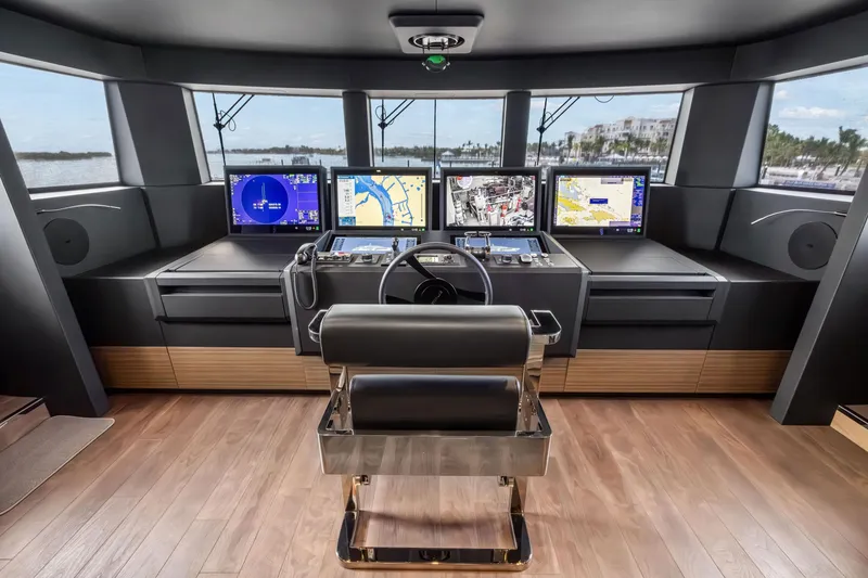 Slide: The Image of Luxurious 2023 Custom Line NAVETTA 42 yacht interior with modern bedroom and ensuite bathroom. - 65