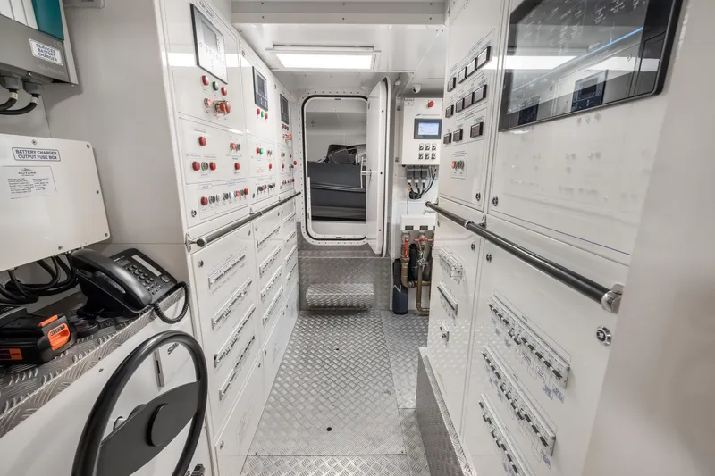 Slide: The Image of Modern kitchen interior on 2023 Custom Line NAVETTA 42 yacht, featuring sleek appliances and minimalist design. - 73