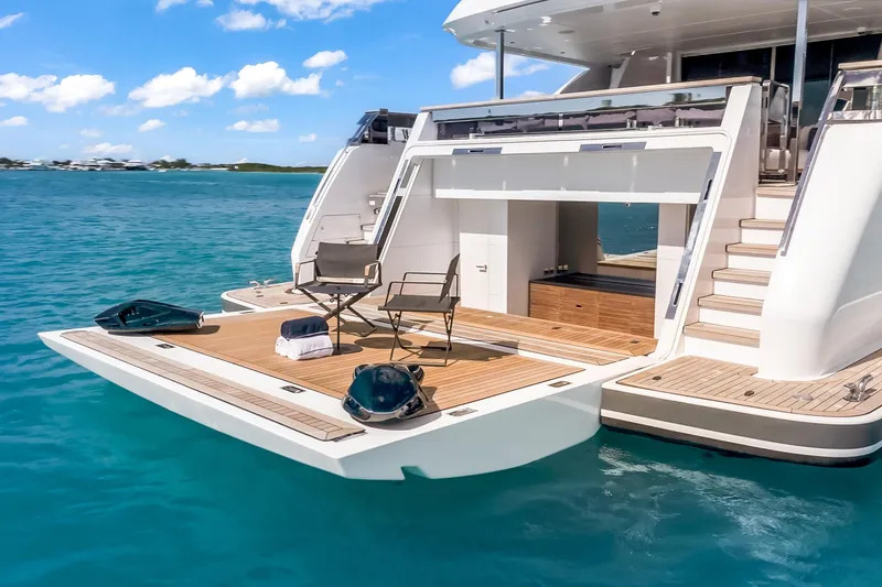 Slide: The Image of Luxurious 2023 Custom Line NAVETTA 42 yacht deck with elegant seating and ocean view. - 88