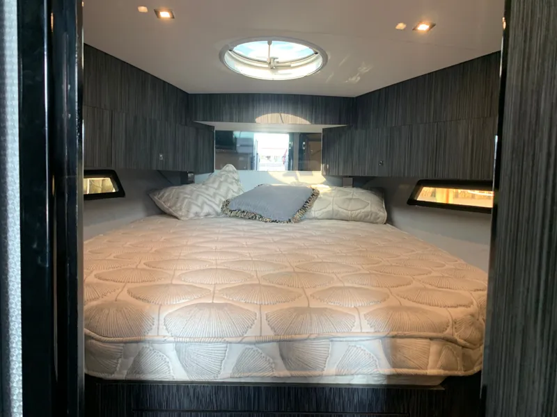 Slide: The Image of Luxurious bedroom in Silverton 4100 SC boat, year 2019. - 14