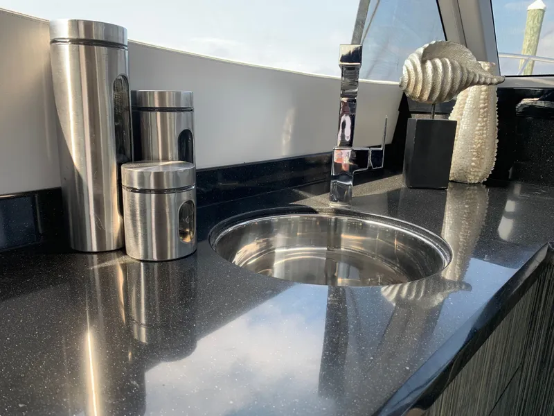 Slide: The Image of Modern yacht kitchen with stainless steel sink and decor. - 20
