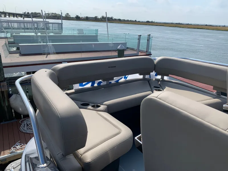 Slide: The Image of Interior of 2019 Silverton 4100 SC yacht overlooking the water. - 21