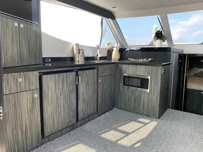 Slide: The Image of Interior of Silverton 4100 SC yacht, modern kitchen, 2019 model. - 23