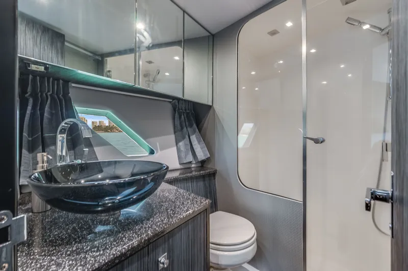 Slide: The Image of Luxurious bathroom on the 2019 Silverton 4100 SC yacht. - 43
