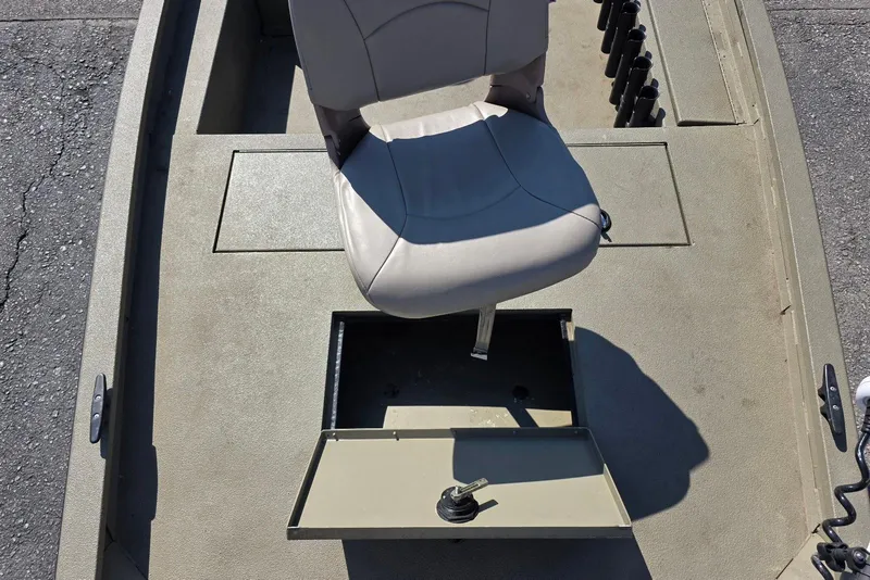 Slide: The Image of 2011 Alumacraft MV 1860 AW SC boat interior with seat and storage compartment. - 15