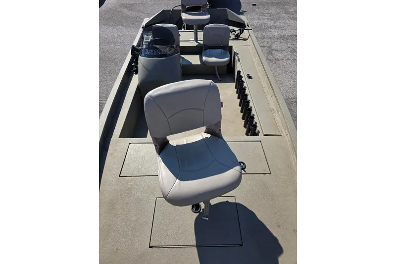 Slide: The Image of 2011 Alumacraft MV 1860 AW SC boat interior with seating and storage compartments. - 16