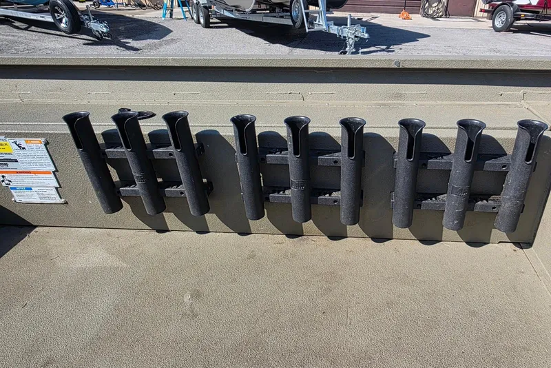 Slide: The Image of 2011 Alumacraft MV 1860 AW SC boat with multiple rod holders installed. - 17