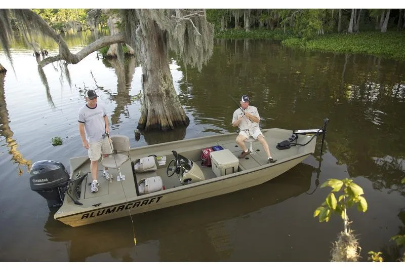 The Image of Two people fishing on a 2011 Alumacraft MV 1860 AW SC boat in a scenic lake. - 2