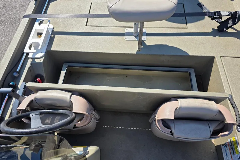 Slide: The Image of 2011 Alumacraft MV 1860 AW SC boat interior with steering wheel and seating. - 20