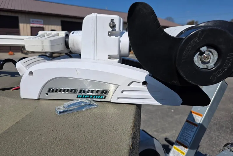 Slide: The Image of Minn Kota Riptide motor on 2011 Alumacraft MV 1860 AW SC boat, outdoor setting. - 6