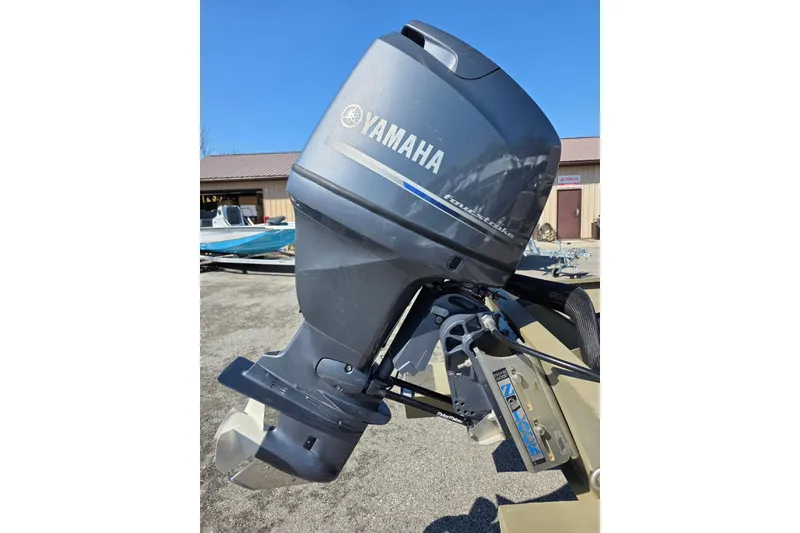 Slide: The Image of 2011 Alumacraft MV 1860 AW SC with Yamaha outboard motor in a sunny outdoor setting. - 9