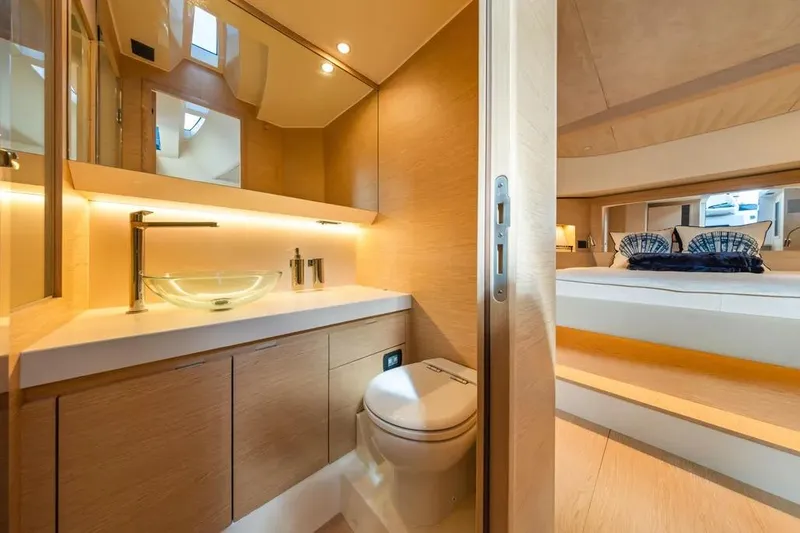 Slide: The Image of Luxurious interior of 2024 Solaris Power 44 Open yacht, featuring modern bathroom and cozy bedroom. - 21