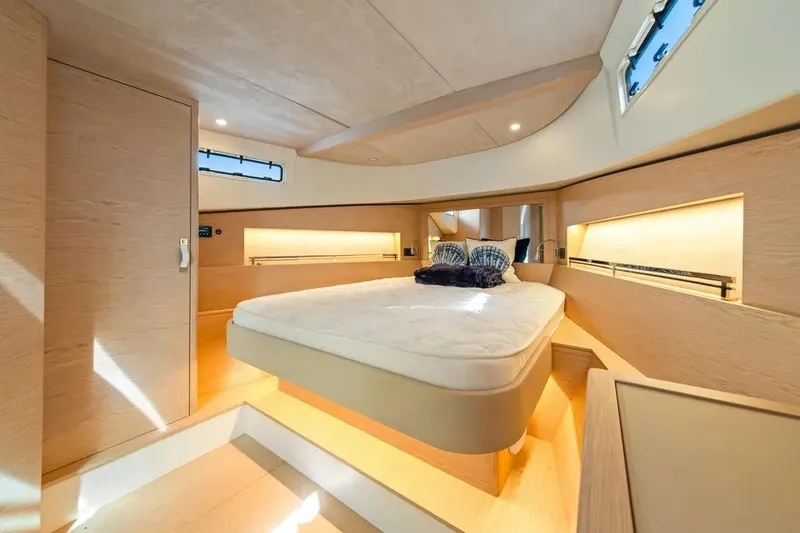Slide: The Image of Luxurious interior of 2024 Solaris Power 44 Open yacht with modern design and cozy bedroom. - 24