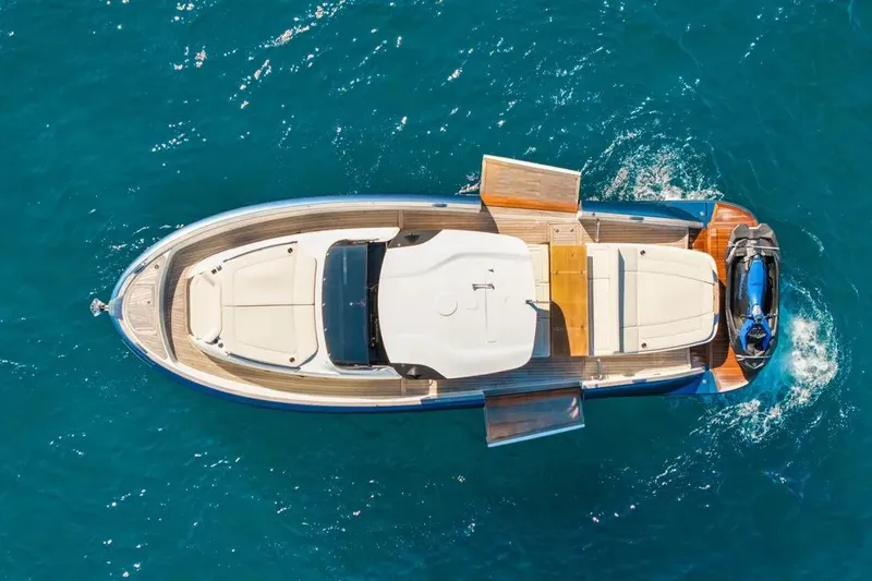 Slide: The Image of 2024 Solaris Power 44 Open yacht, aerial view on blue ocean water. - 3