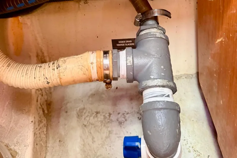 Slide: The Image of Plumbing system in 2009 Beneteau Oceanis 43 sailboat, featuring pipes and connectors. - 100