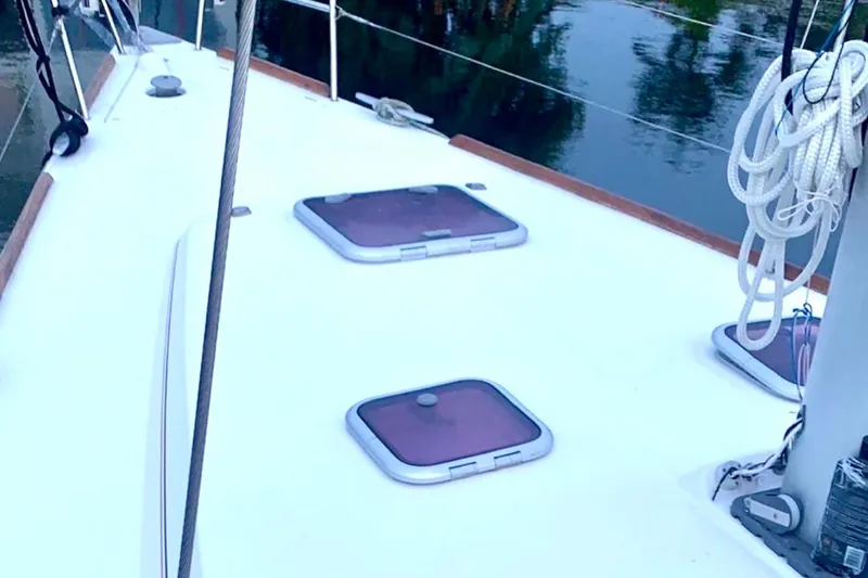 Slide: The Image of Deck of 2009 Beneteau Oceanis 43 sailboat with hatches and rigging. - 11