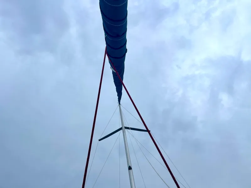 Slide: The Image of Mast of a 2009 Beneteau Oceanis 43 sailboat against cloudy sky. - 22