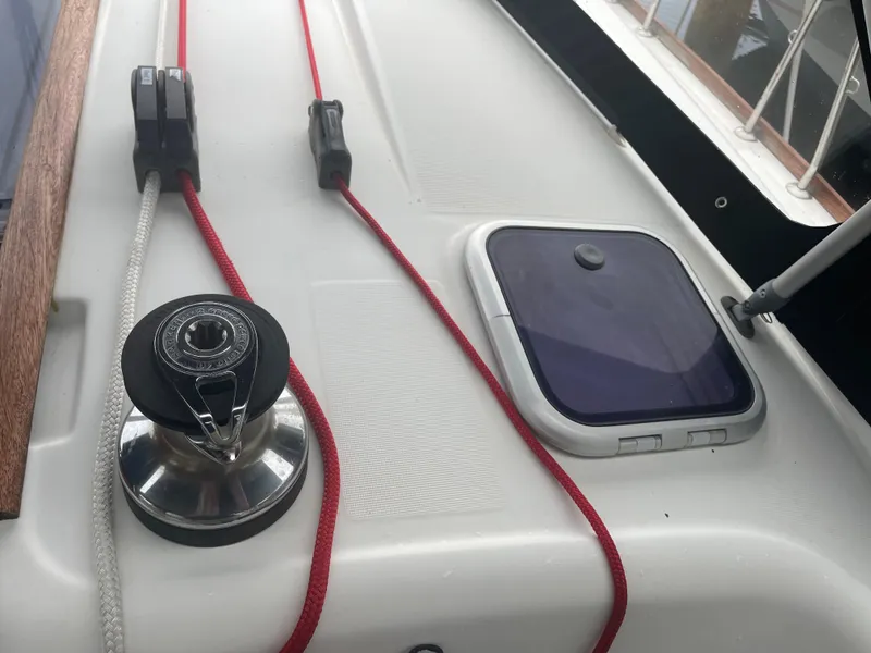 Slide: The Image of Deck view of 2009 Beneteau Oceanis 43 with winch and ropes. - 33